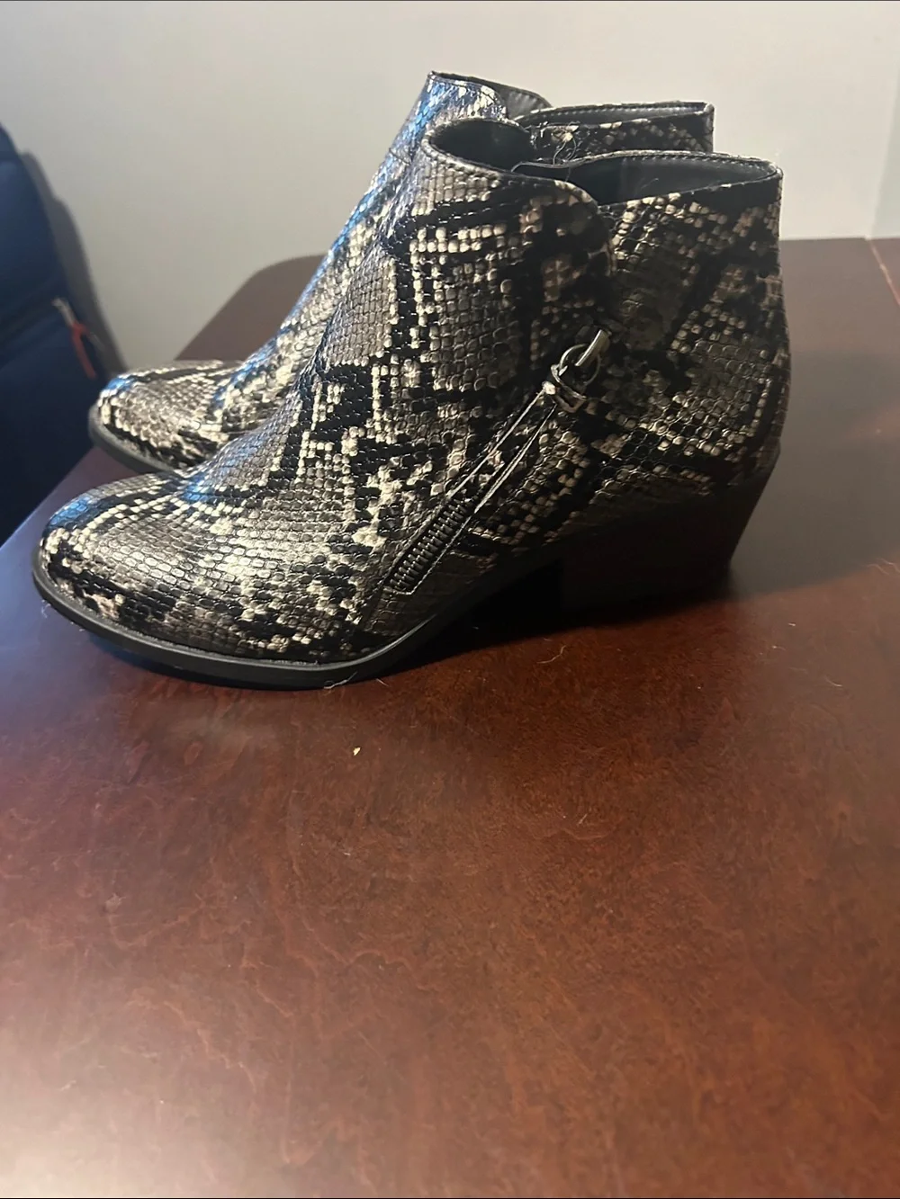 Arizona Jean Company Snake-Print Ankle Booties in Black and Cream